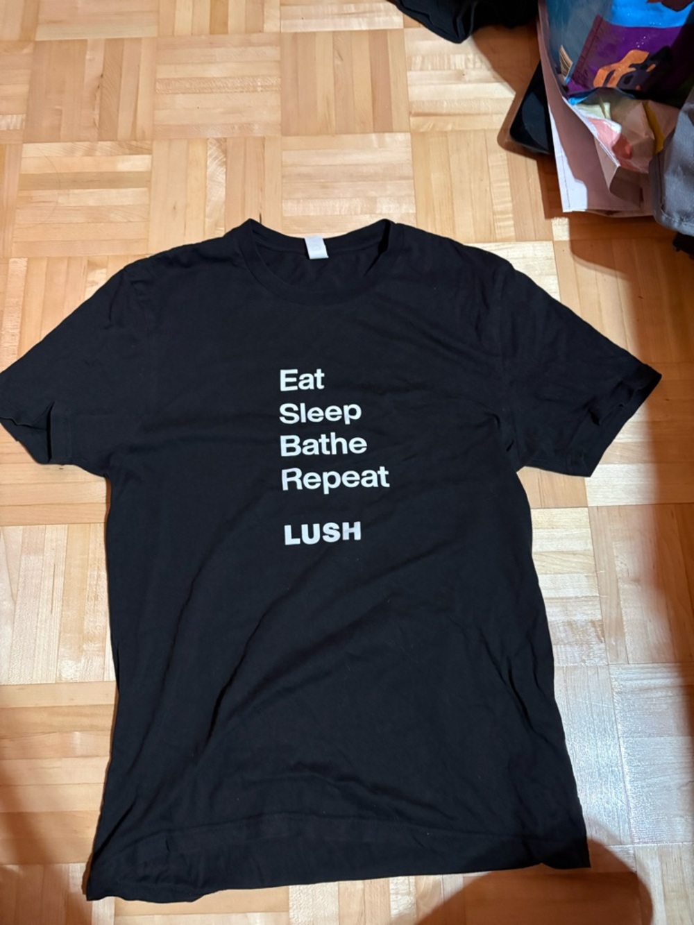 Lush Black T-Shirt with White Vertical Text